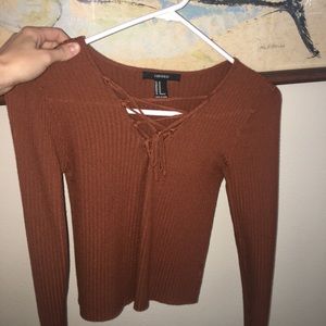 Orange tighter fit top with lace up